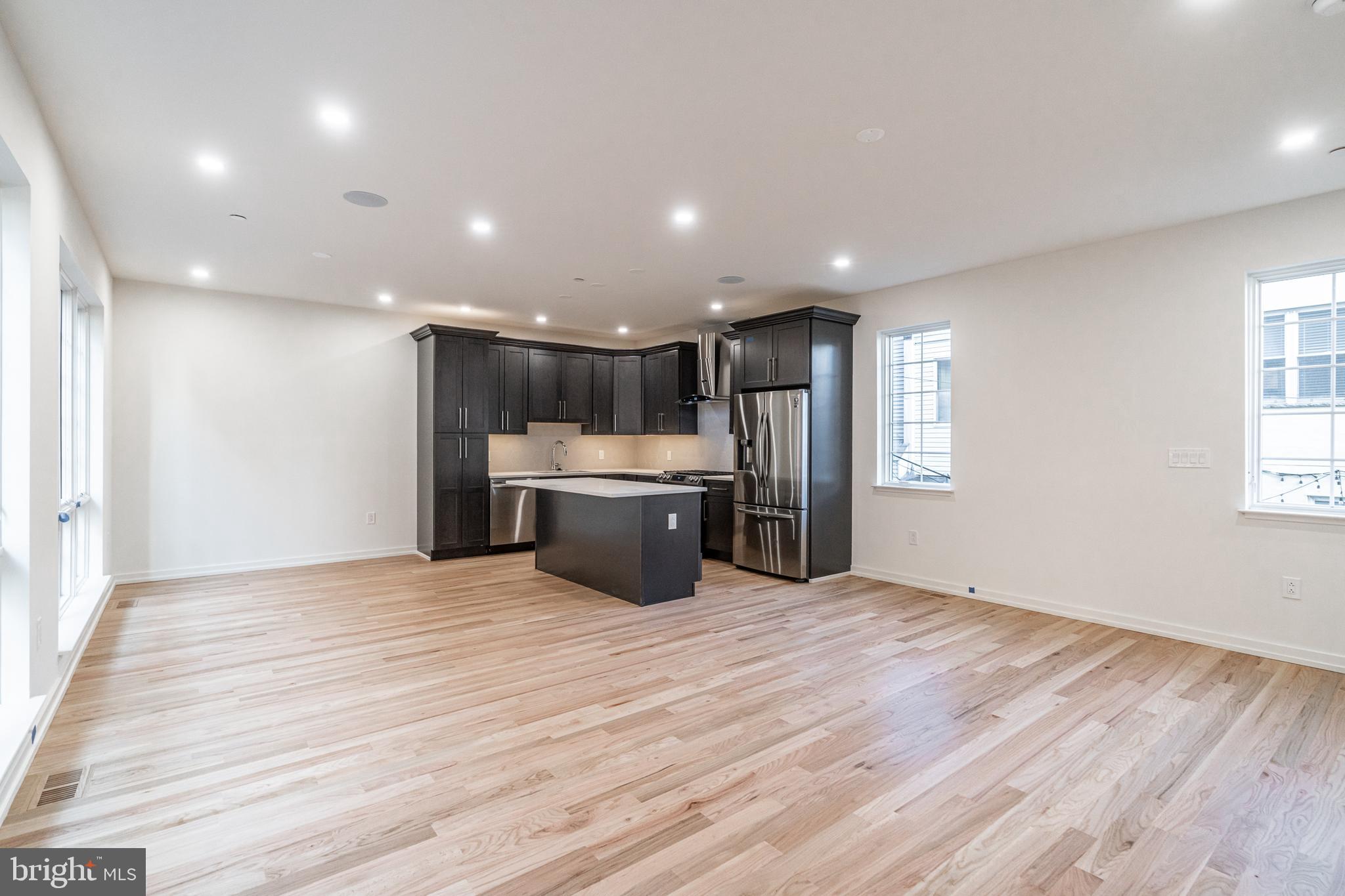 2423 Innovator Way Philadelphia, PA 19146 - Photo 10 of 34 a view of a kitchen with a sink and wooden floor