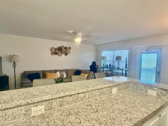 a bed room with a bed and mirror