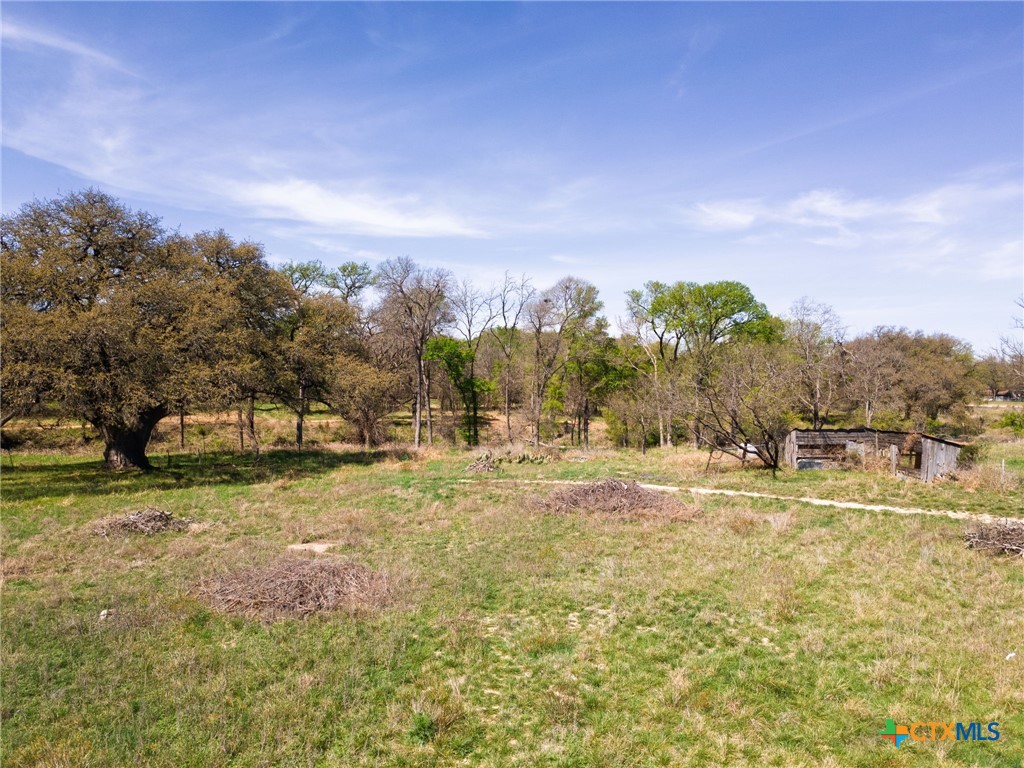 Tbd East 3rd Street Lampasas, TX 76550 - Photo 3 of 18 a view of a yard with a trees