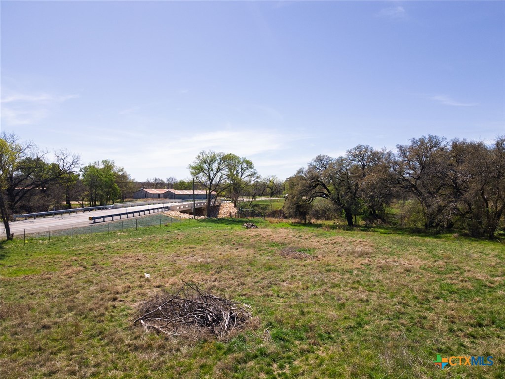 Tbd East 3rd Street Lampasas, TX 76550 - Photo 4 of 18 a view of a field with trees in the background