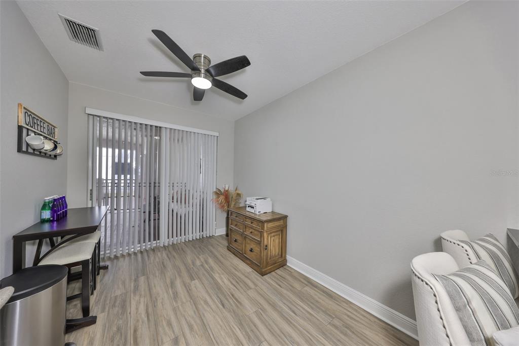 1038 Bellasol Way, Unit 202 Apollo Beach, FL 33572 - Photo 11 of 52 a living room with furniture