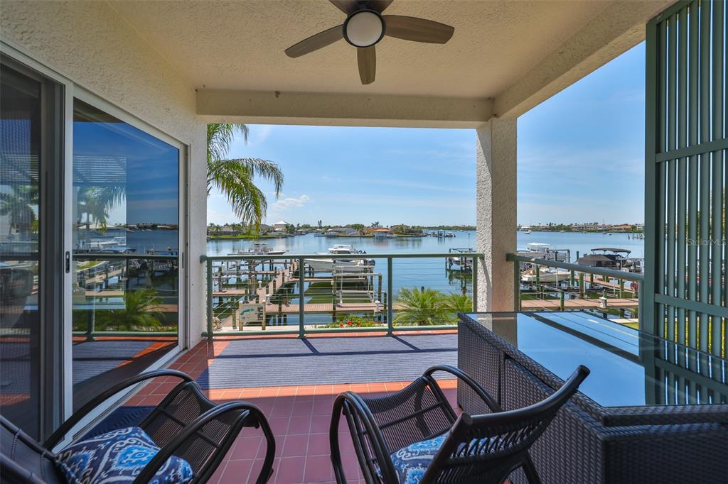 1038 Bellasol Way, Unit 202 Apollo Beach, FL 33572 - Photo 26 of 52 a very nice looking room with a large window and a table