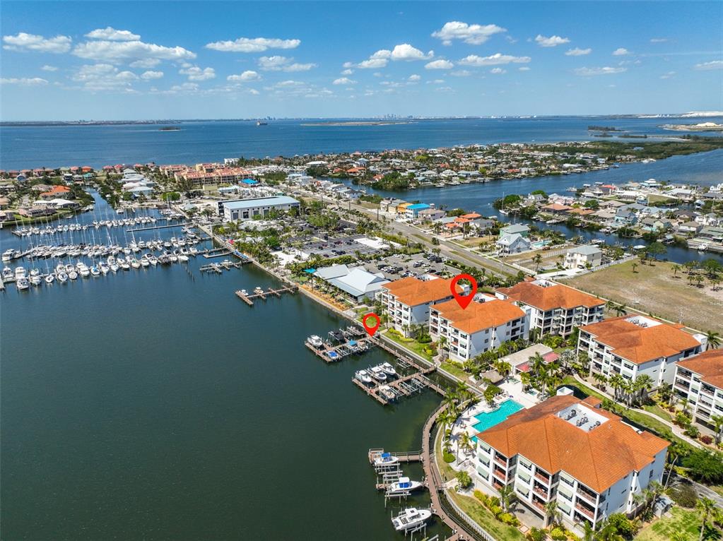 1038 Bellasol Way, Unit 202 Apollo Beach, FL 33572 - Photo 3 of 52 an aerial view of residential houses with outdoor space