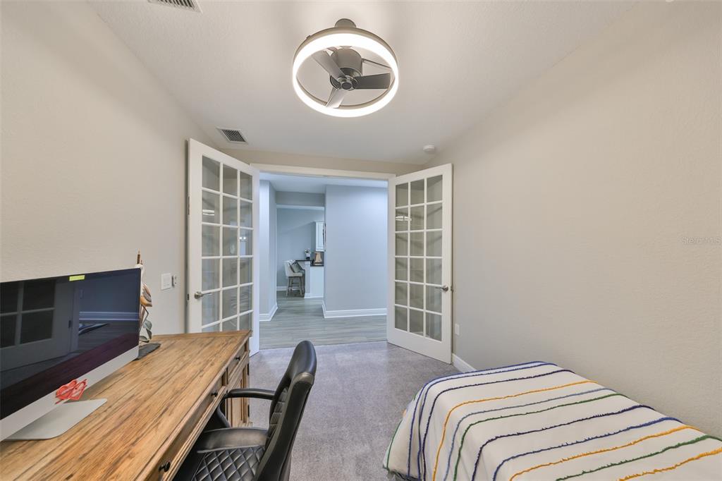 1038 Bellasol Way, Unit 202 Apollo Beach, FL 33572 - Photo 33 of 52 a bedroom with a bed and a window