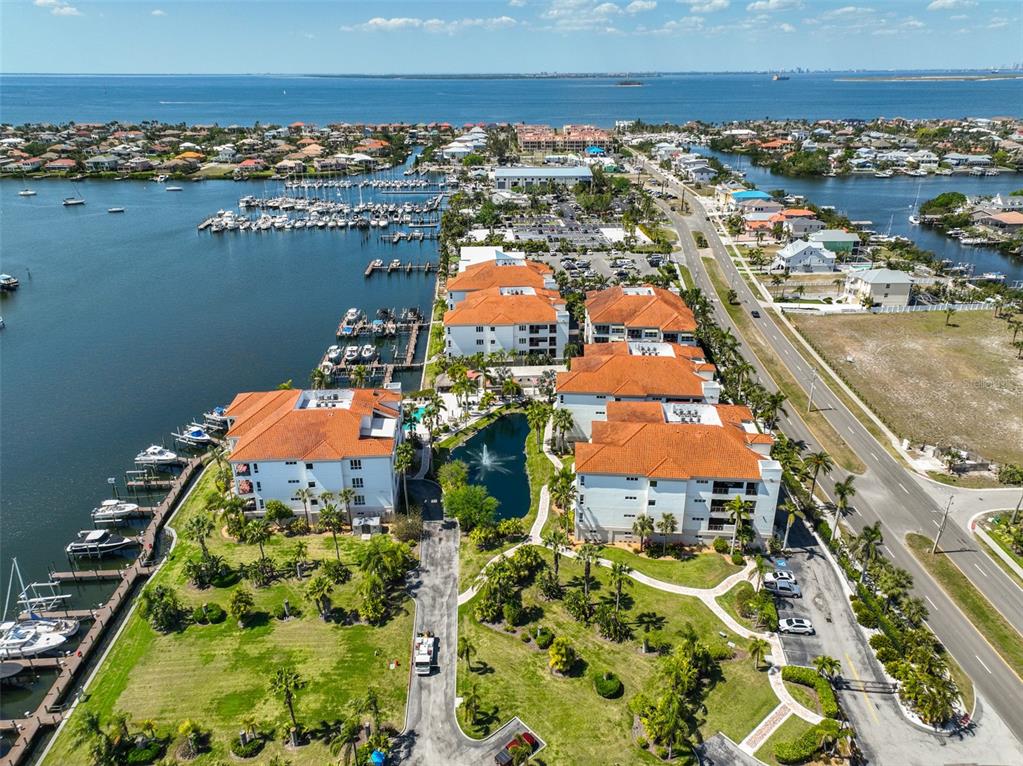 1038 Bellasol Way, Unit 202 Apollo Beach, FL 33572 - Photo 40 of 52 an aerial view of a houses with outdoor space
