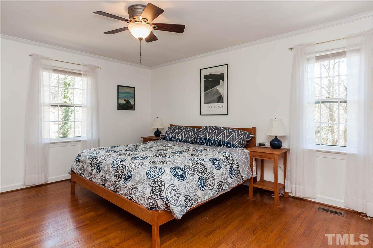 7008 Robbie Drive Raleigh, NC 27607 - Photo 11 of 21 a bedroom with bed and window