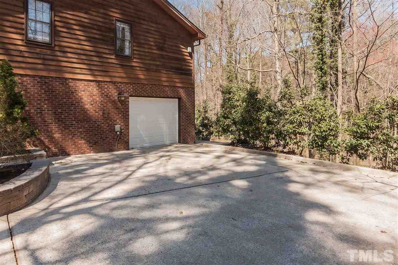 7008 Robbie Drive Raleigh, NC 27607 - Photo 20 of 21 a view of a backyard of the house