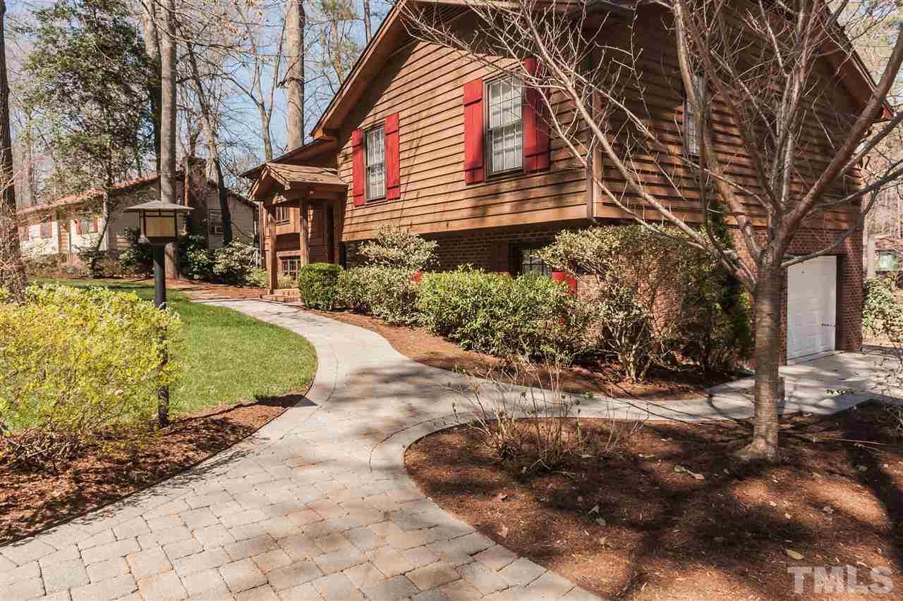 7008 Robbie Drive Raleigh, NC 27607 - Photo 2 of 21 a view of a house with a yard