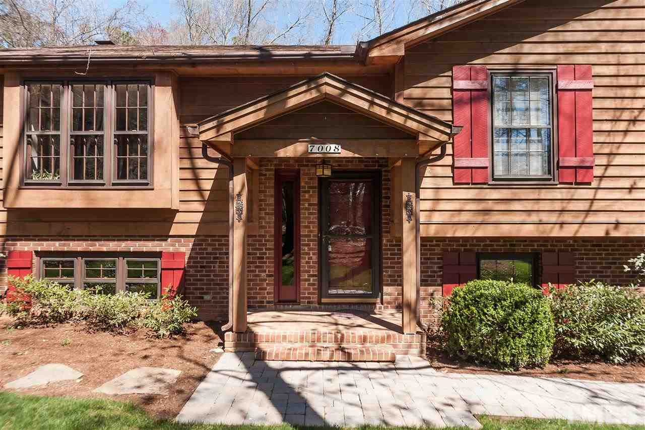 7008 Robbie Drive Raleigh, NC 27607 - Photo 3 of 21 a front view of a house