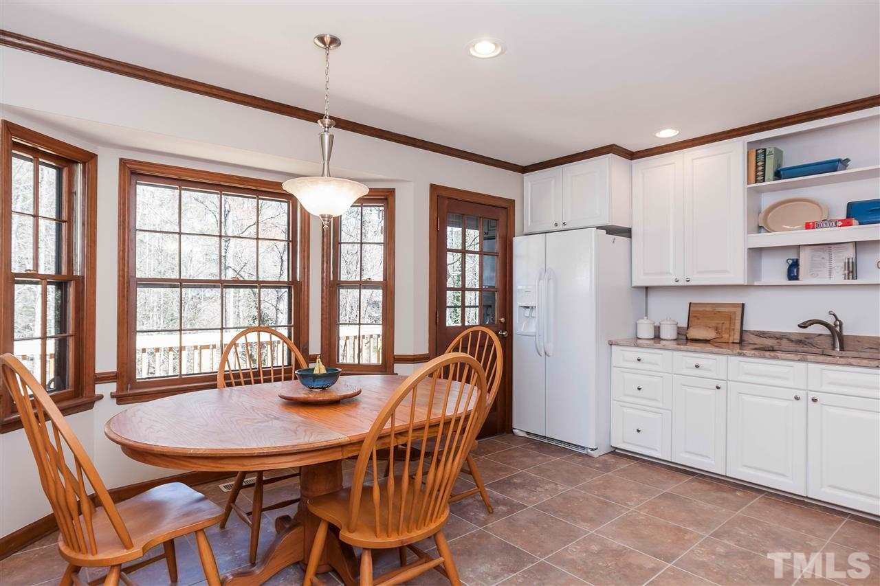 7008 Robbie Drive Raleigh, NC 27607 - Photo 9 of 21 a dining room with furniture and window