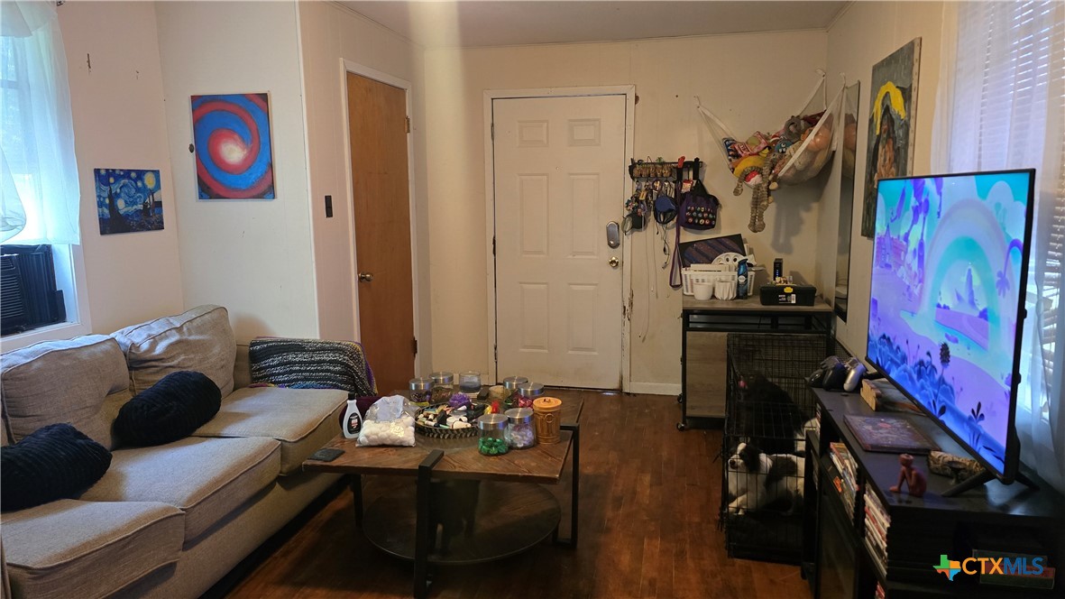 206 Cheeves Avenue Port Lavaca, TX 77979 - Photo 21 of 28 a bedroom with bed and a couch