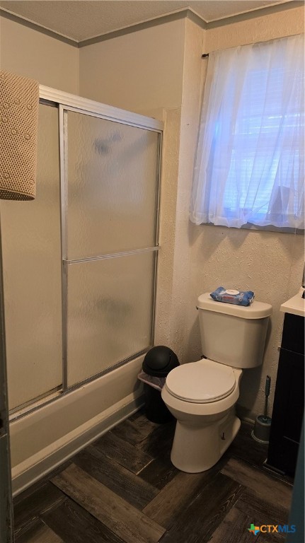 206 Cheeves Avenue Port Lavaca, TX 77979 - Photo 25 of 28 a bathroom with a toilet and a shower curtain