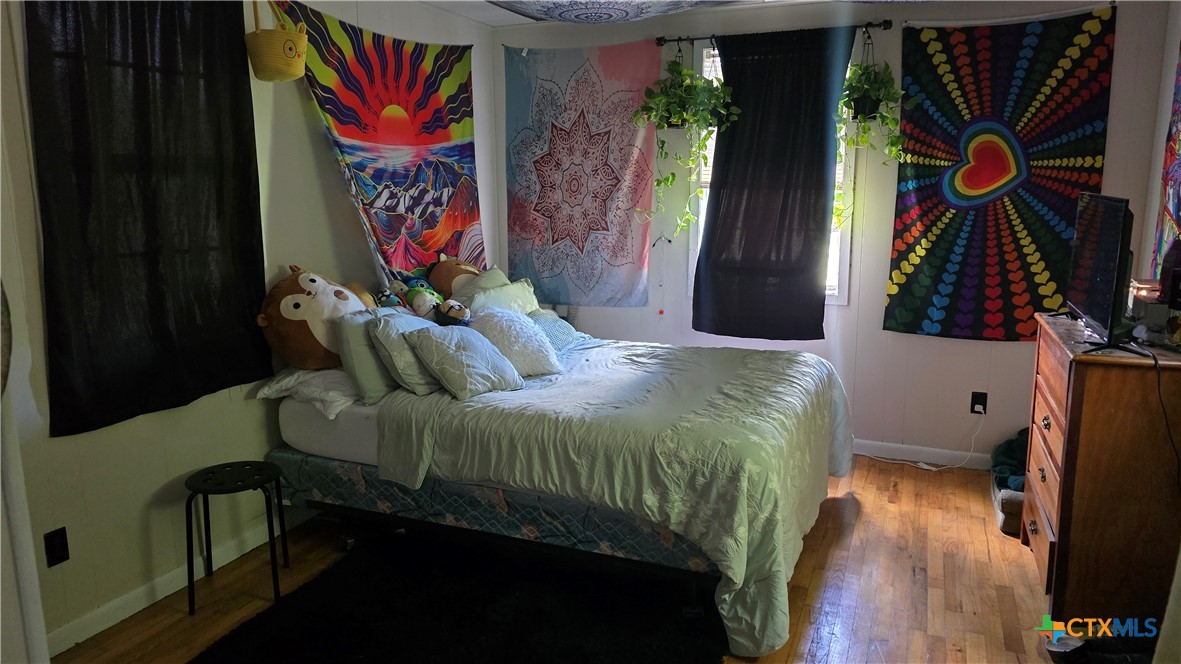 206 Cheeves Avenue Port Lavaca, TX 77979 - Photo 28 of 28 a bedroom with a bed and a window