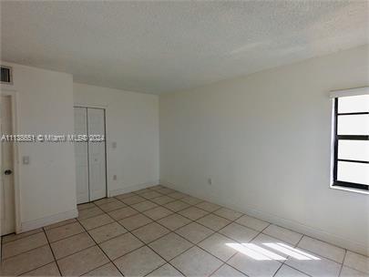 6445 Indian Creek Drive, Unit B16 Miami Beach, FL 33141 - Photo 11 of 18 a view of room with window