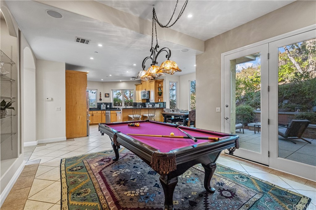 24806 Carlos Place Newhall, CA 91321 - Photo 11 of 44 a room with pool table and windows
