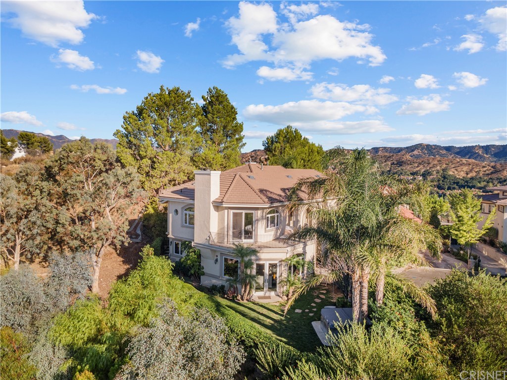 24806 Carlos Place Newhall, CA 91321 - Photo 2 of 44 a view of a city with a building in the background