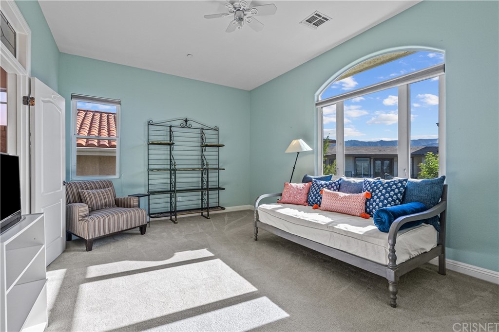 24806 Carlos Place Newhall, CA 91321 - Photo 36 of 44 a living room with furniture and a window