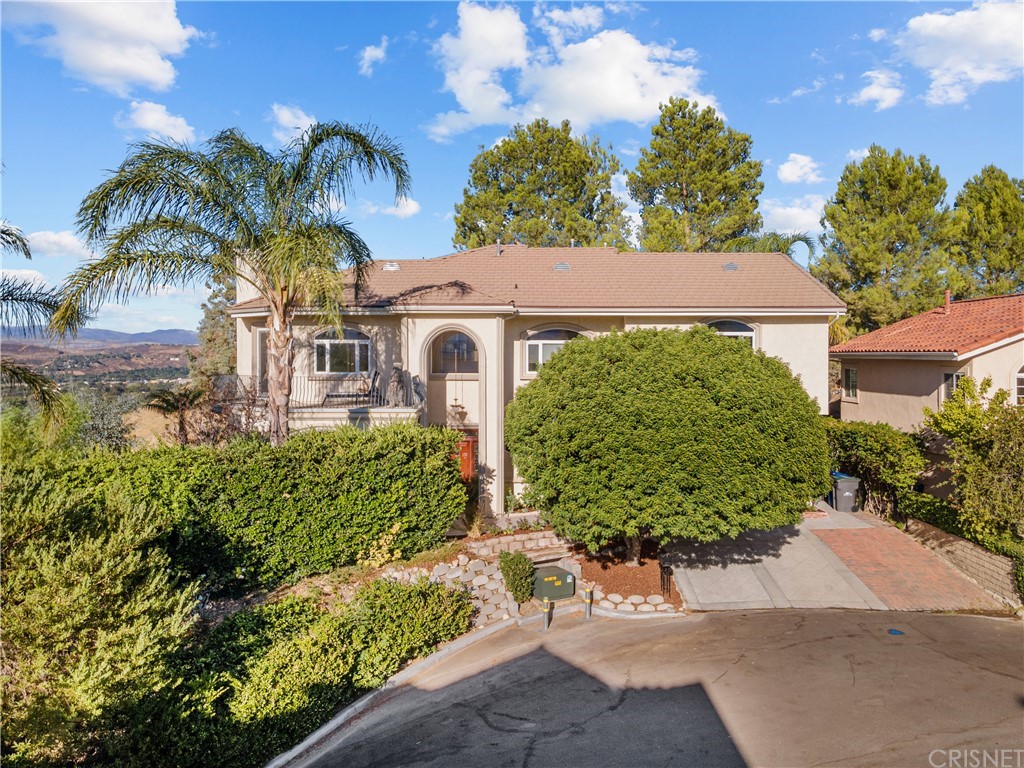 24806 Carlos Place Newhall, CA 91321 - Photo 39 of 44 front view of a house with a yard
