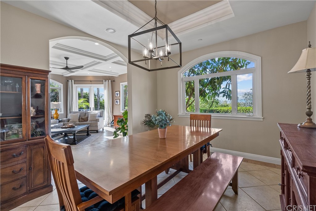 24806 Carlos Place Newhall, CA 91321 - Photo 9 of 44 a view of a dining room with furniture window and outside view