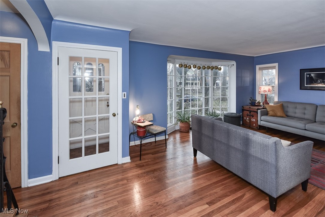 2469 Queenston Road Cleveland, OH 44118 - Photo 5 of 37 Living area with baseboards and wood finished floors