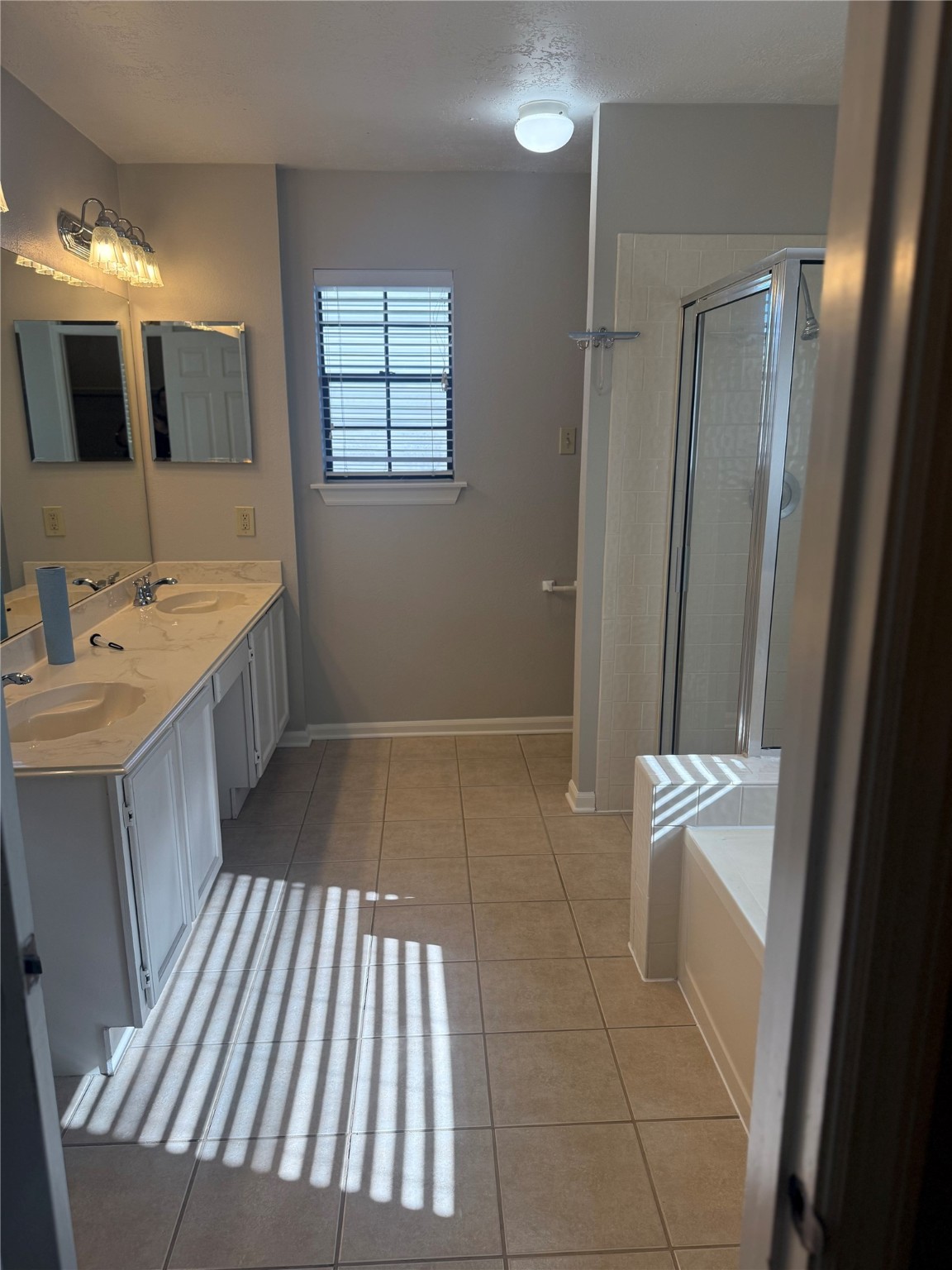 818 Noble Springs Road Houston, TX 77062 - Photo 12 of 12 a bathroom with a sink a toilet and mirror
