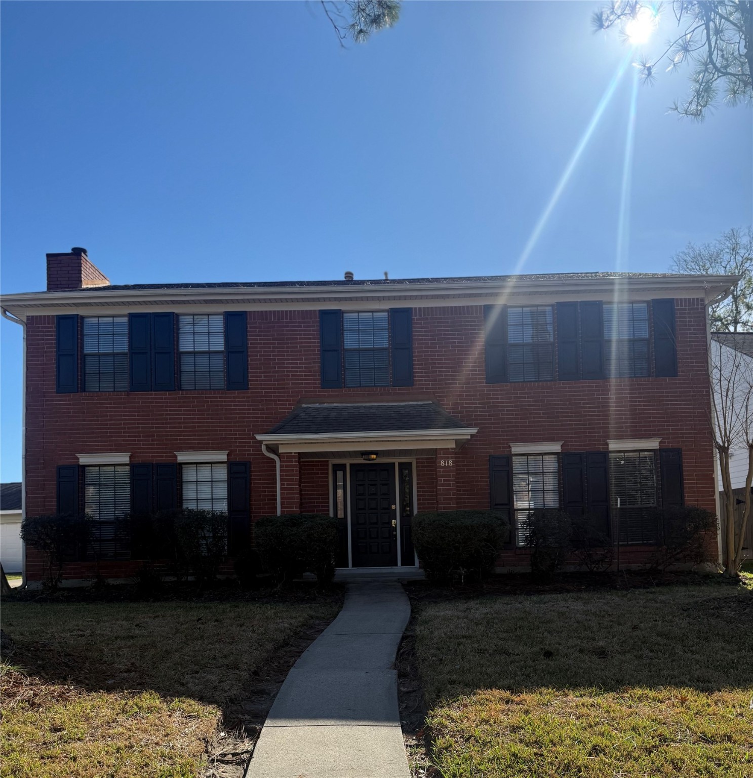 818 Noble Springs Road Houston, TX 77062 - Photo 2 of 12 a front view of a house with a yard