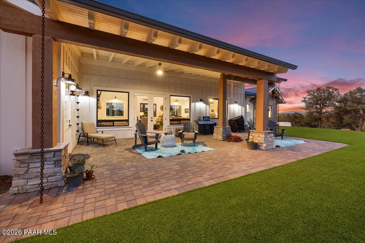 10255 North Chaos Ranch Road Prescott, AZ 86305 - Photo 62 of 101 a view of a house with backyard porch and sitting area
