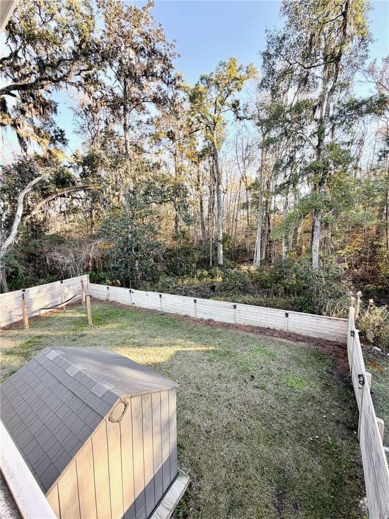 106 Crown Circle Brunswick, GA 31525 - Photo 3 of 25 Rear Wooded Views