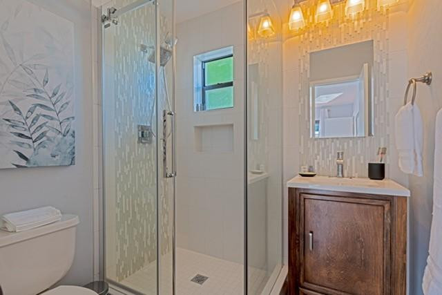 1311 Southwest 56th Avenue Plantation, FL 33317 - Photo 12 of 31 a bathroom with a sink a toilet and shower