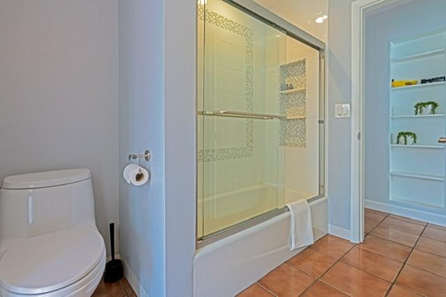1311 Southwest 56th Avenue Plantation, FL 33317 - Photo 13 of 31 a bathroom with a toilet and shower