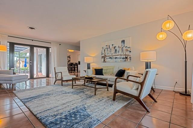 1311 Southwest 56th Avenue Plantation, FL 33317 - Photo 19 of 31 a living room with furniture and wooden floor