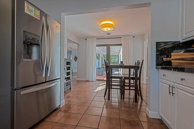 1311 Southwest 56th Avenue Plantation, FL 33317 - Photo 8 of 31 a kitchen with stainless steel appliances granite countertop a refrigerator and a stove top oven
