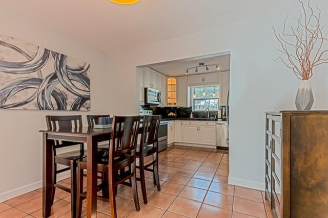 1311 Southwest 56th Avenue Plantation, FL 33317 - Photo 9 of 31 a view of a dining room with furniture