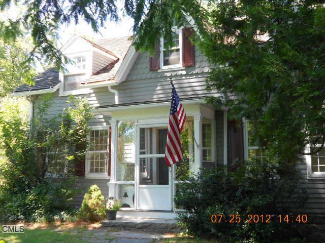 223 Florida Road Ridgefield, CT 06877 - Photo 1 of 1 a front view of a house with a yard
