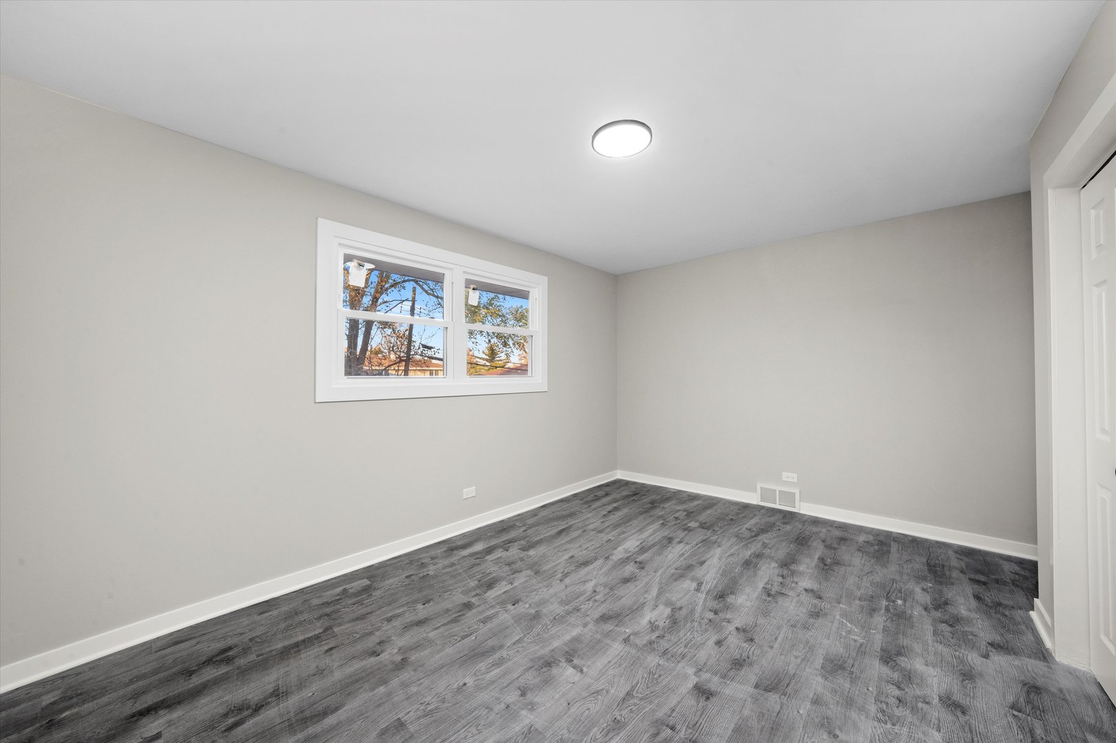 8938 West 85th Place Justice, IL 60458 - Photo 18 of 39 wooden floor in a empty room