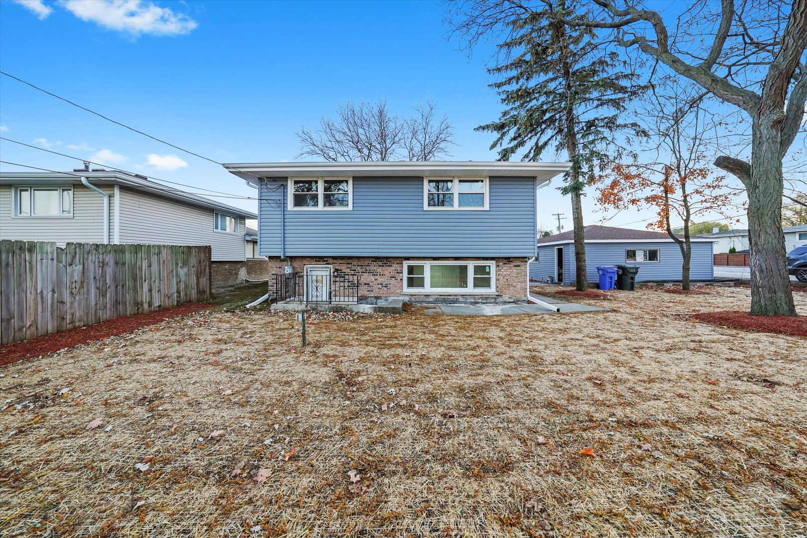 8938 West 85th Place Justice, IL 60458 - Photo 34 of 39 a backyard of a house with oven and tree