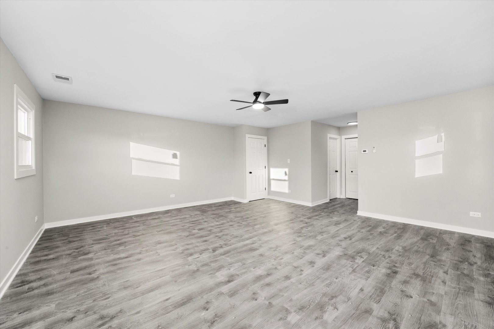 8938 West 85th Place Justice, IL 60458 - Photo 7 of 39 a view of an empty room with a window