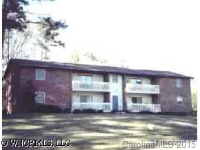 643 Brookside Camp Road, Unit B Hendersonville, NC 28792 - Photo 1 of 1 a view of a building with a large window