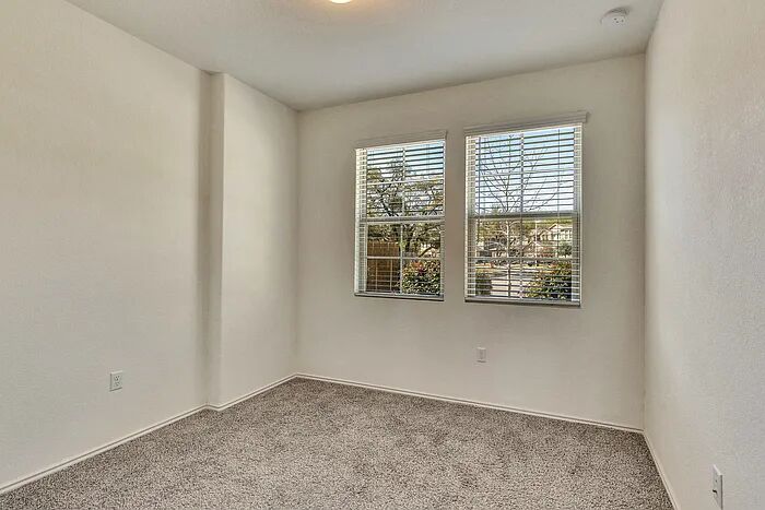 10403 Bramble Berry Drive Austin, TX 78748 - Photo 16 of 21 an empty room with windows