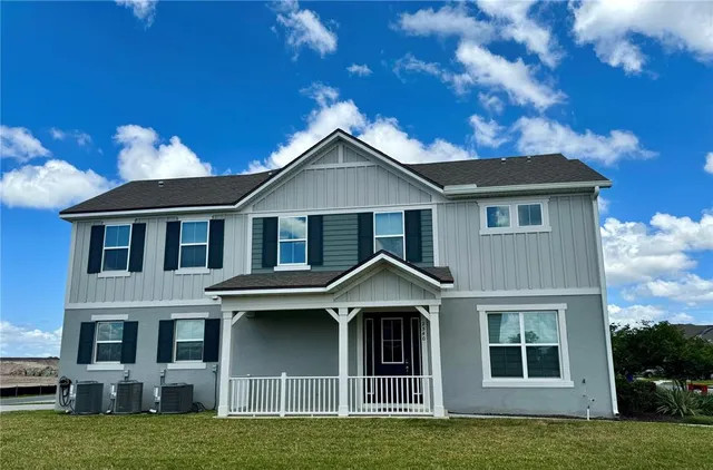 a view of a yard in front of a house