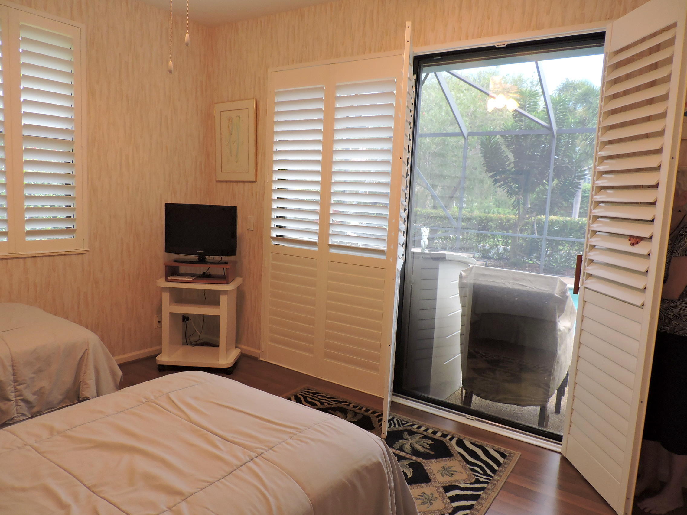 7738 La Corniche Circle Boca Raton, FL 33433 - Photo 34 of 41 Guest Bedroom To Pool