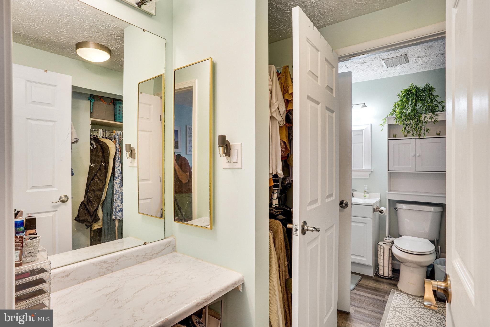 8345 Windfall Road Springfield, VA 22153 - Photo 14 of 30 a bathroom with a toilet and a shower