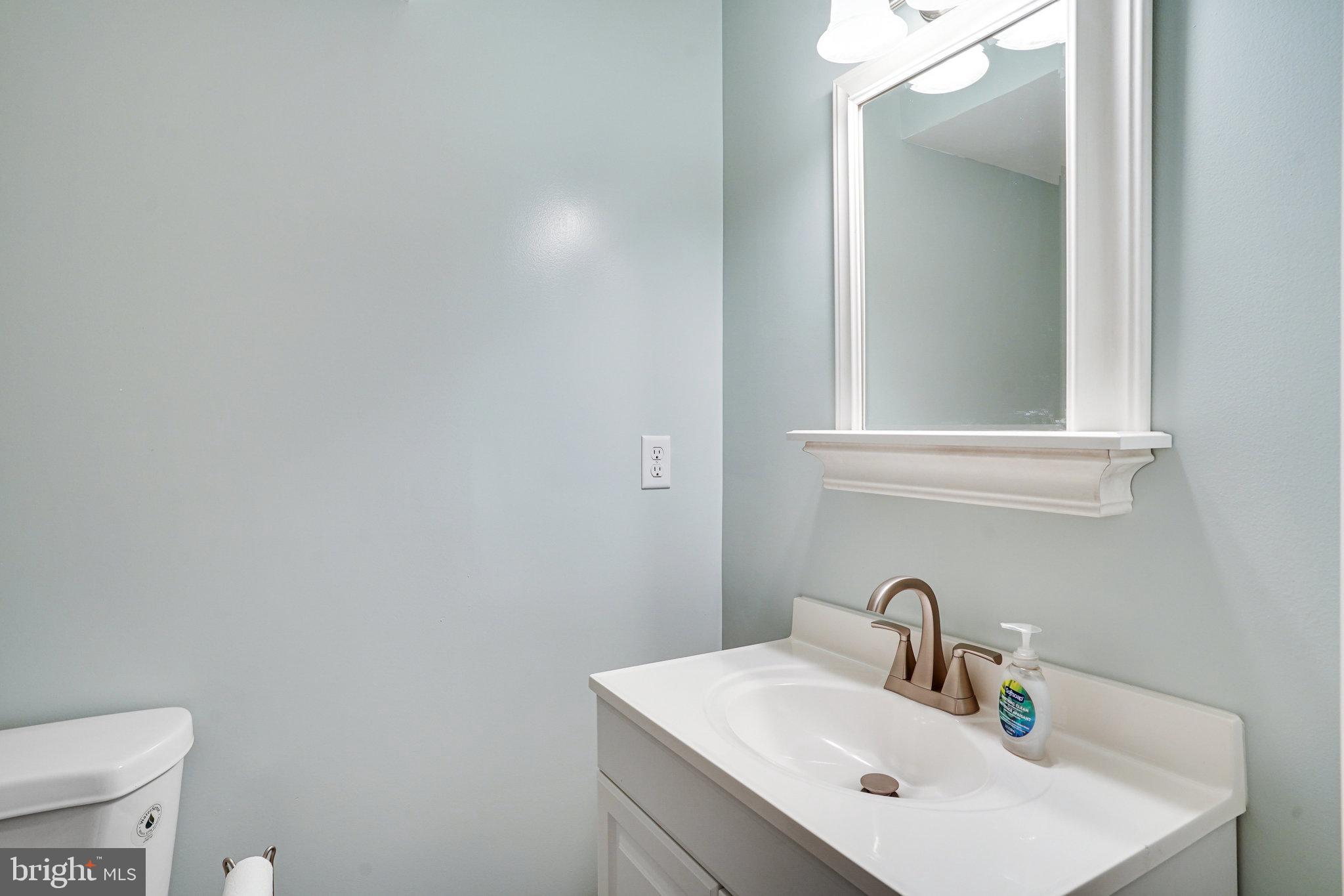 8345 Windfall Road Springfield, VA 22153 - Photo 21 of 30 a bathroom with a sink and a toilet