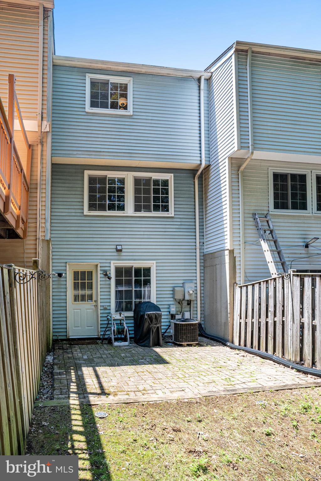 8345 Windfall Road Springfield, VA 22153 - Photo 26 of 30 a front view of a house with parking