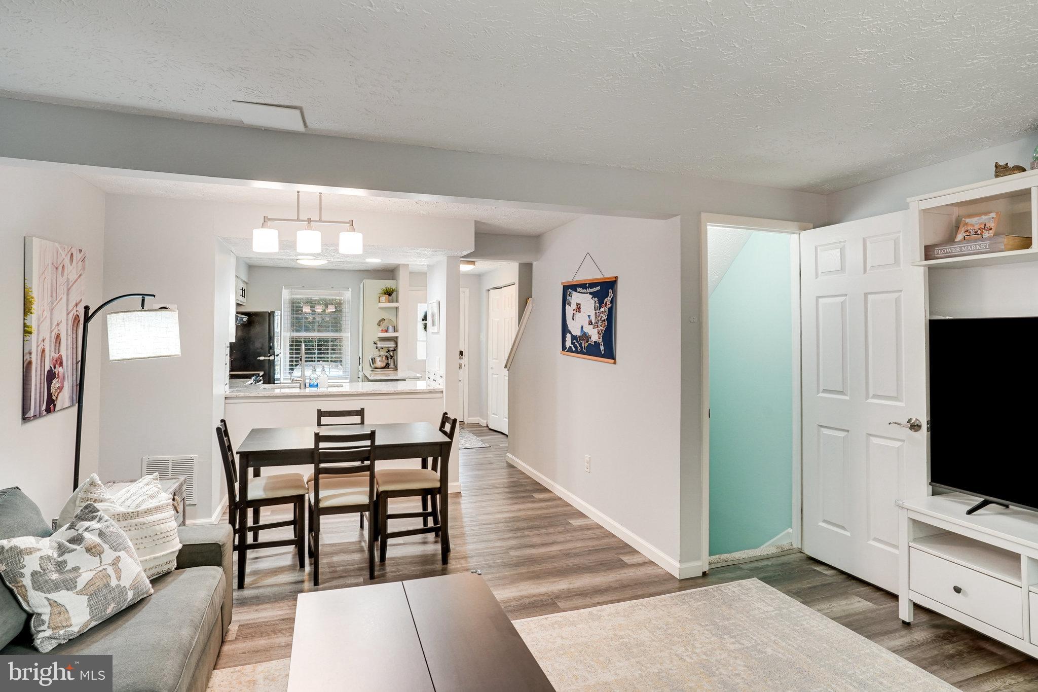 8345 Windfall Road Springfield, VA 22153 - Photo 10 of 30 a view of a livingroom with furniture and window