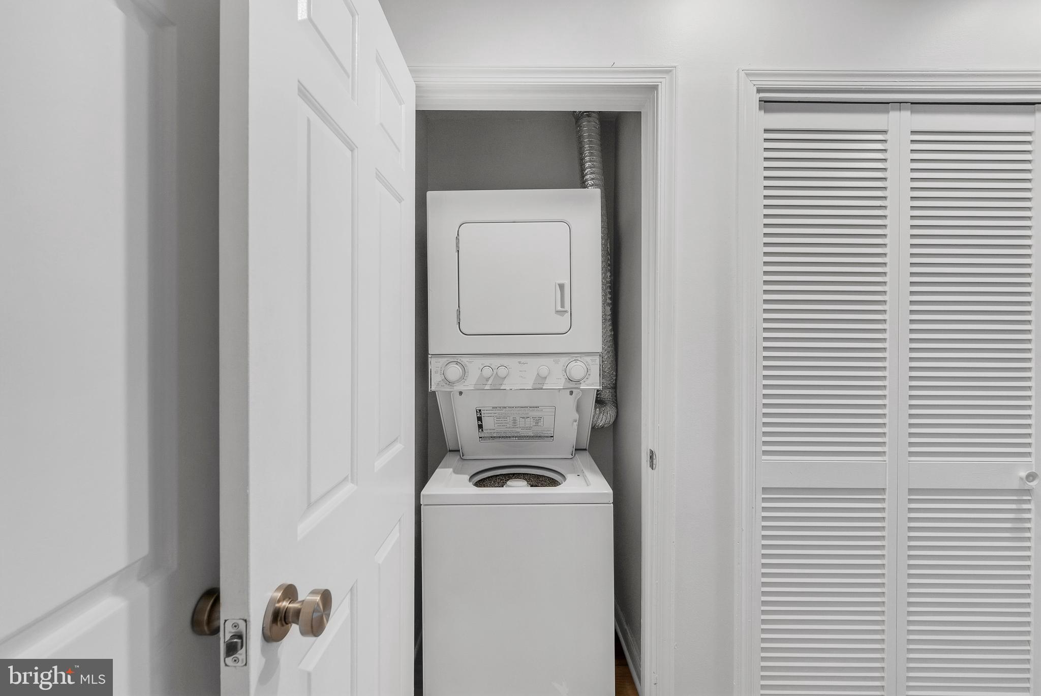 2519 I Street Northwest, Unit 1 Washington, DC 20037 - Photo 32 of 71 a utility room with a washer and dryer