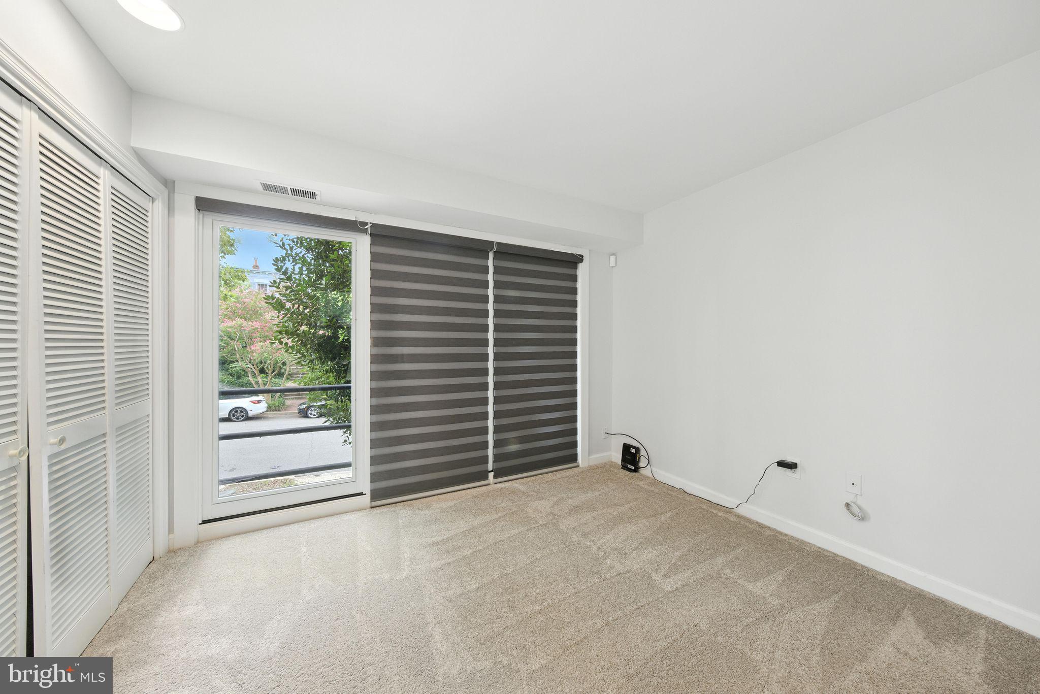 2519 I Street Northwest, Unit 1 Washington, DC 20037 - Photo 42 of 71 a view of an empty room with a window