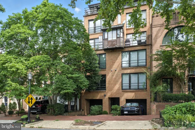 en empty room with large windows