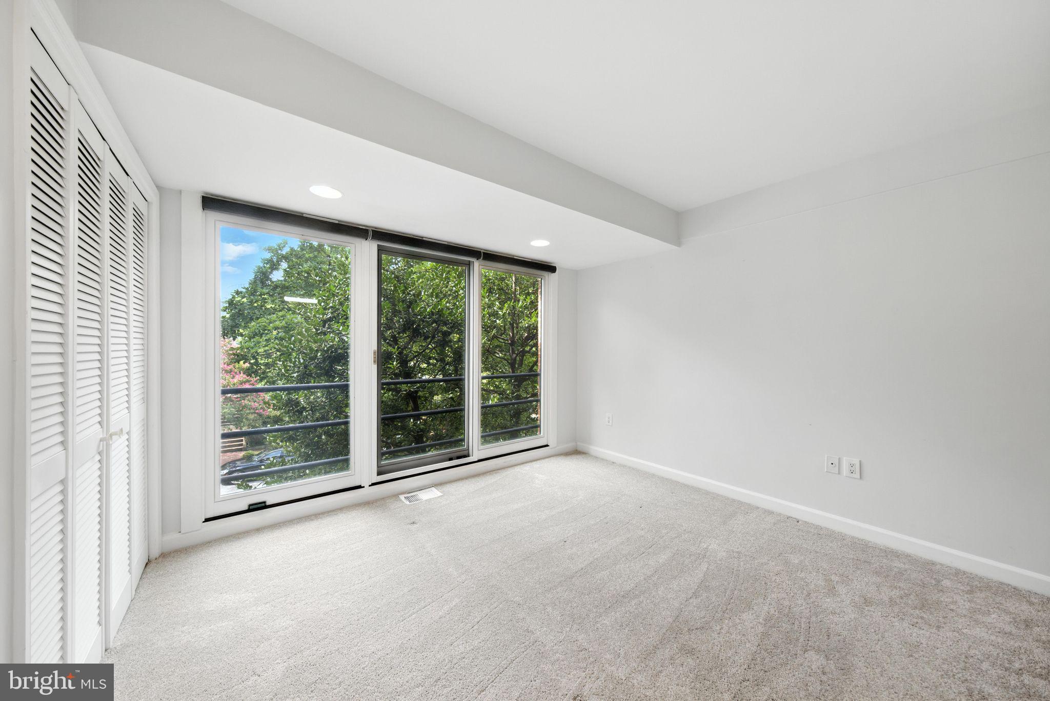 2519 I Street Northwest, Unit 1 Washington, DC 20037 - Photo 70 of 71 en empty room with large windows
