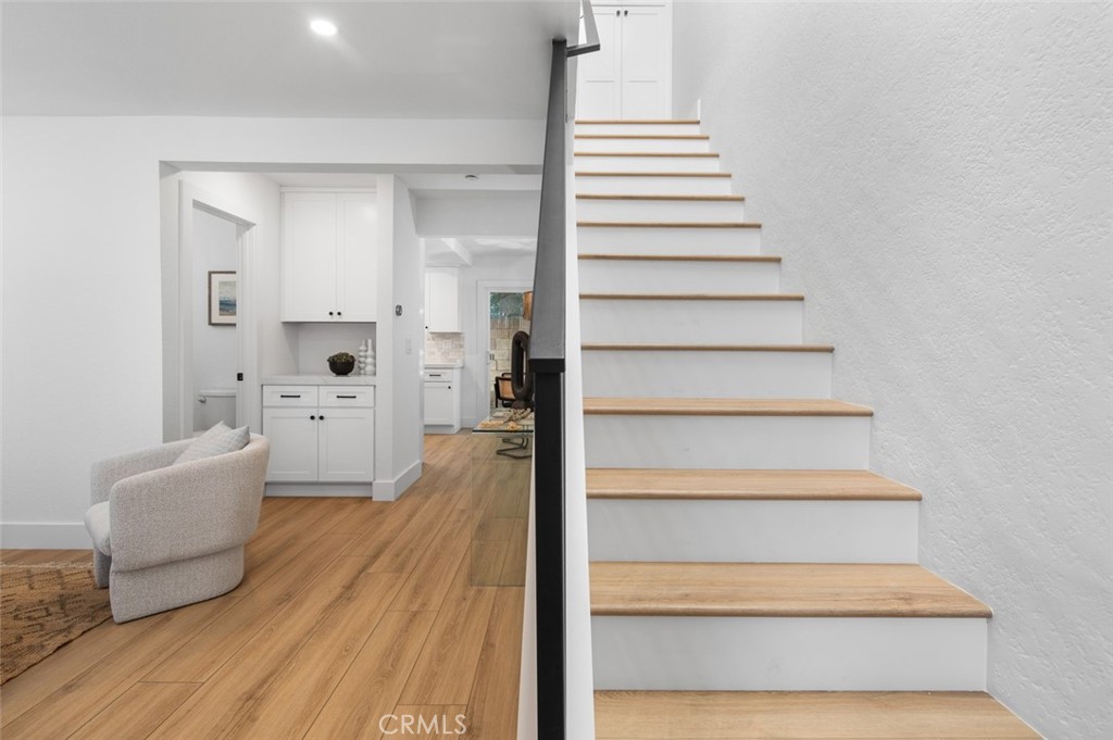 3905 Hazard Avenue, Unit B22 Santa Ana, CA 92703 - Photo 15 of 30 a view of entryway and hall with wooden floor
